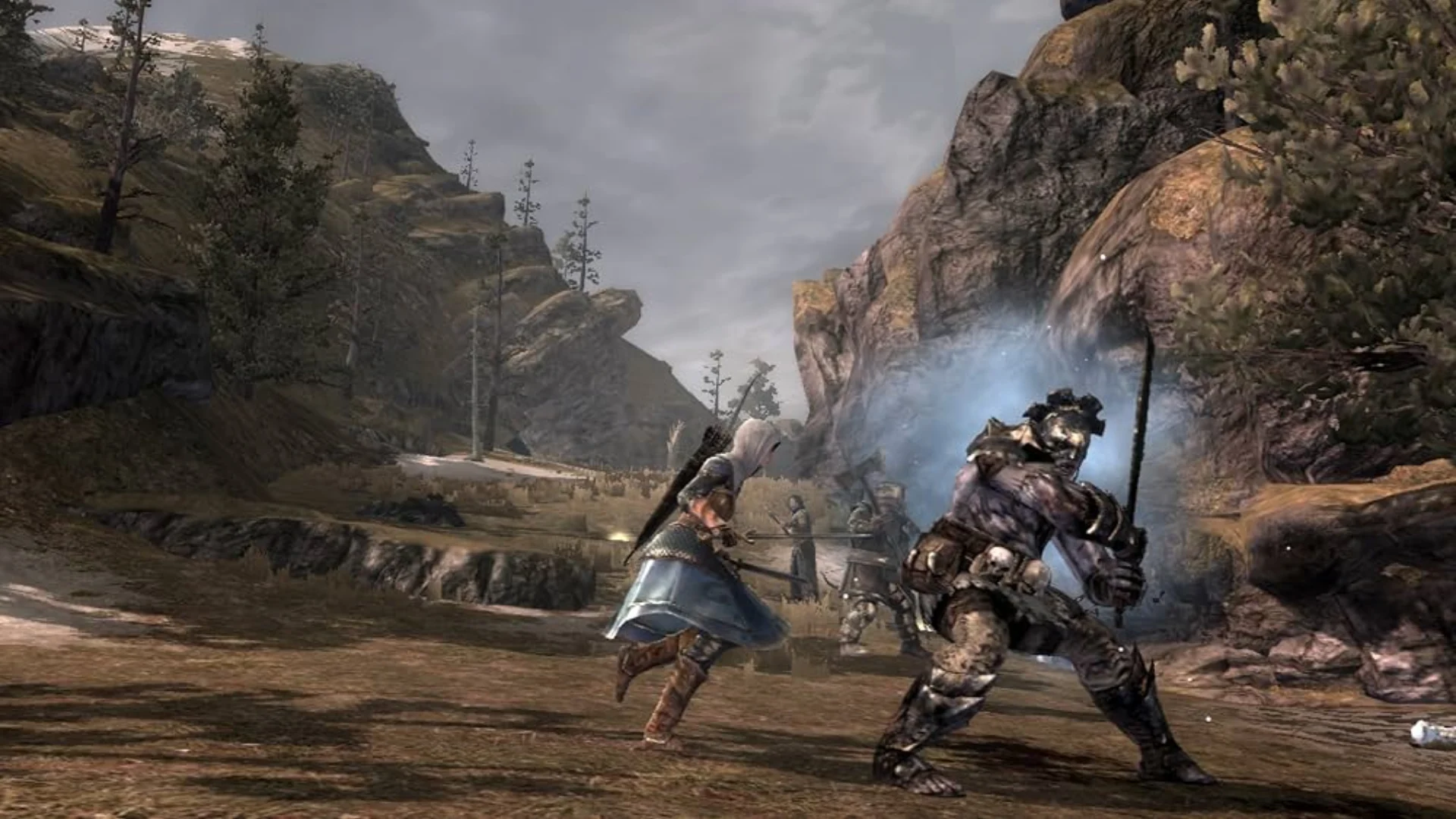 A hero fights an armored Orc during an outdoor battle in The Lord of the Rings: War in the North.