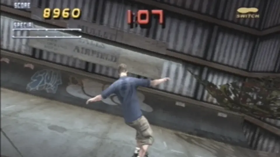 Skater grinding along a curved rail in Tony Hawk’s Pro Skater 2.