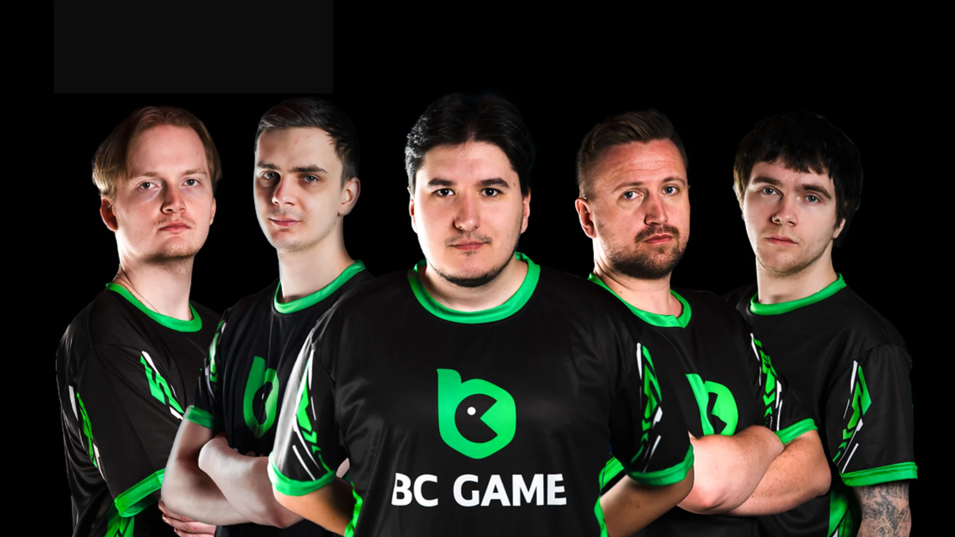 Five BC.Game Counter-Strike 2 esports players posing together in black and green team jerseys.