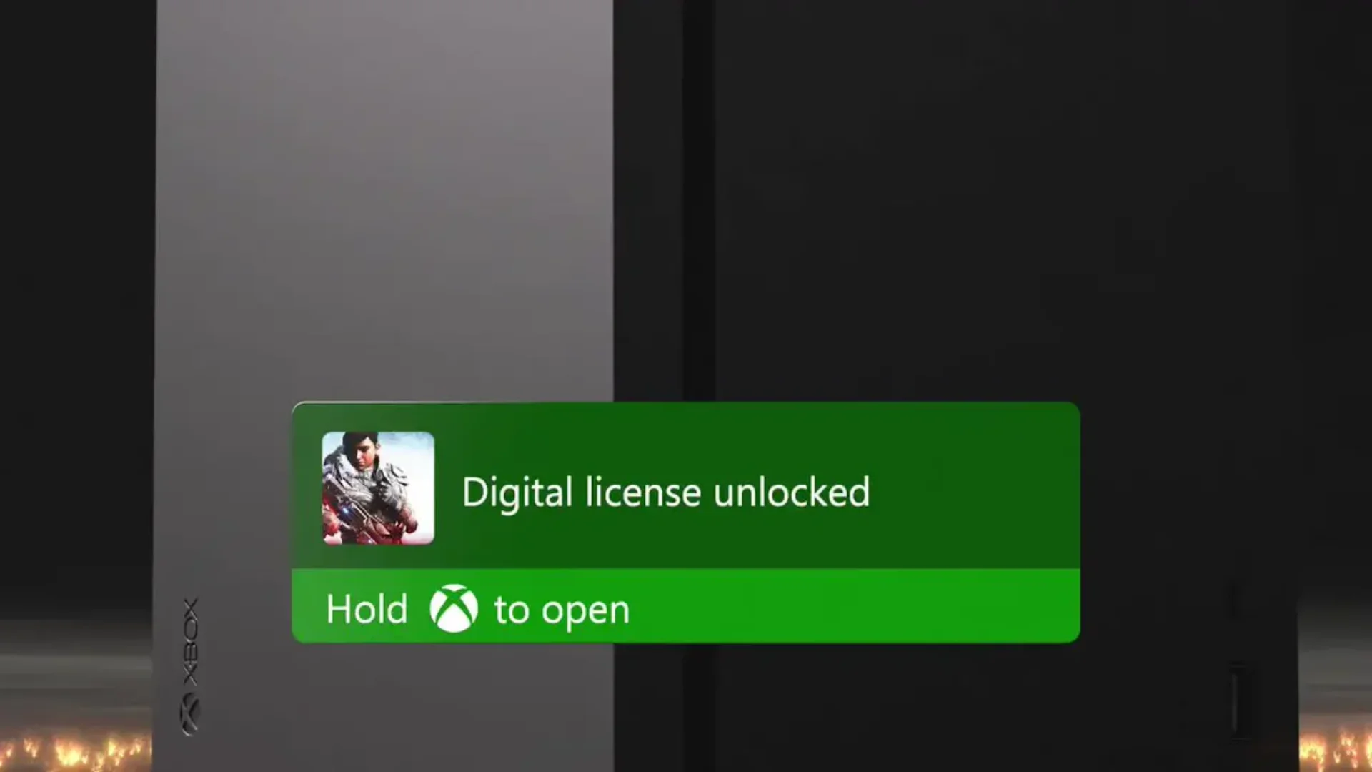 Xbox notification reading Digital license unlocked appears over an Xbox console after a physical game is registered.