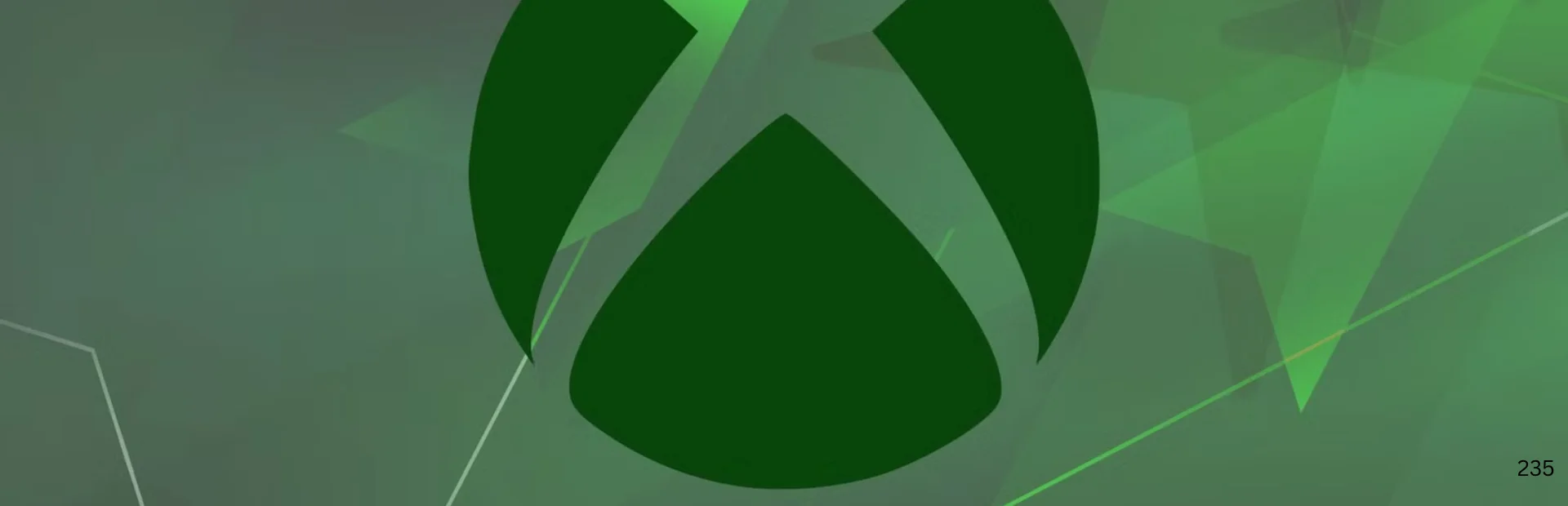 Large Xbox logo displayed against a layered green geometric background.